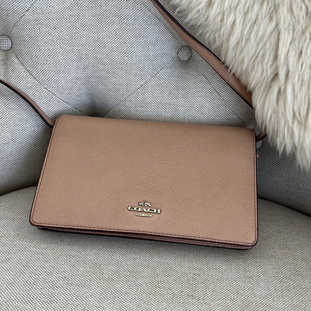 Coach fold over clutch with crossbody strap in beige